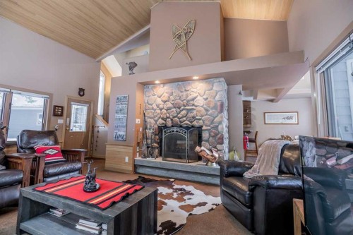 107 Mount View, Waterton Park, AB - Indoor Photo Showing Living Room With Fireplace