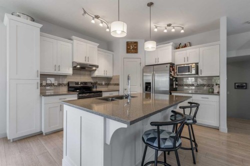 428 Sixmile Cove South, Lethbridge, AB - Indoor Photo Showing Kitchen With Double Sink