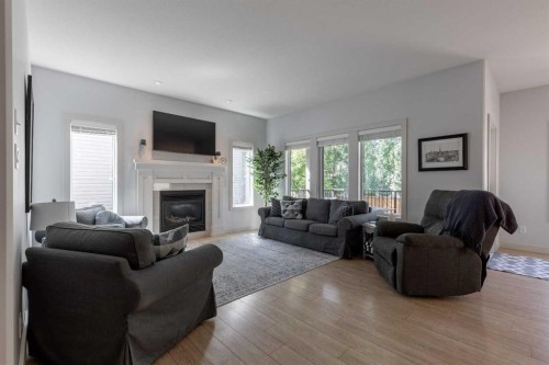 428 Sixmile Cove South, Lethbridge, AB - Indoor Photo Showing Living Room With Fireplace