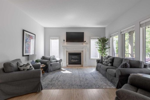 428 Sixmile Cove South, Lethbridge, AB - Indoor Photo Showing Living Room With Fireplace