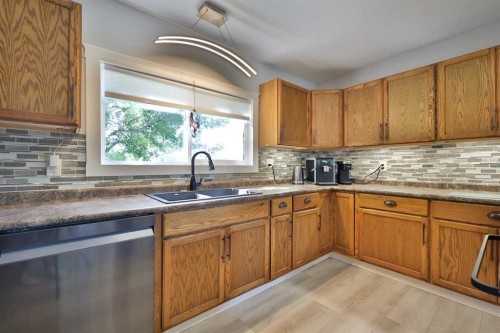 228 Centre Street, Magrath, AB - Indoor Photo Showing Kitchen With Double Sink