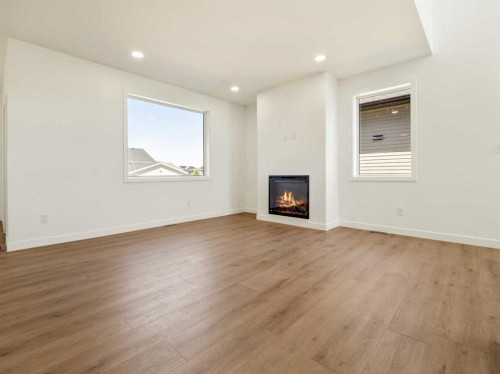 332 Rivergrove Chase West, Lethbridge, AB - Indoor With Fireplace