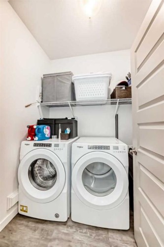 673 Aquitania Boulevard West, Lethbridge, AB - Indoor Photo Showing Laundry Room