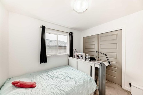 673 Aquitania Boulevard West, Lethbridge, AB - Indoor Photo Showing Bedroom