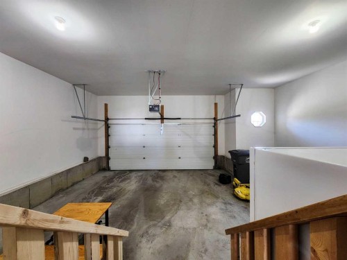 41 Westlyn Drive, Claresholm, AB - Indoor Photo Showing Garage