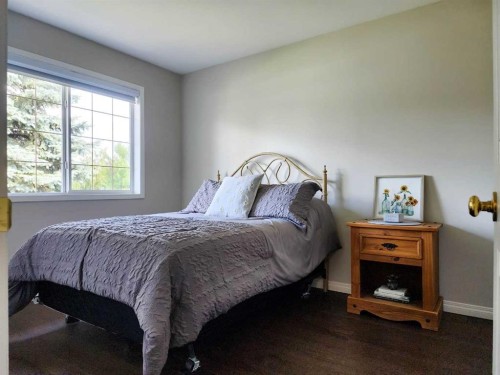 41 Westlyn Drive, Claresholm, AB - Indoor Photo Showing Bedroom