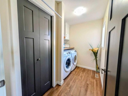 7 Greywolf Road North, Lethbridge, AB - Indoor Photo Showing Laundry Room