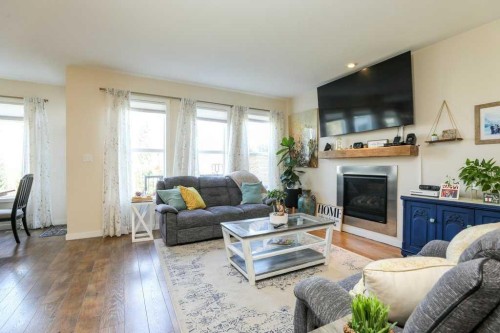7 Greywolf Road North, Lethbridge, AB - Indoor Photo Showing Living Room With Fireplace