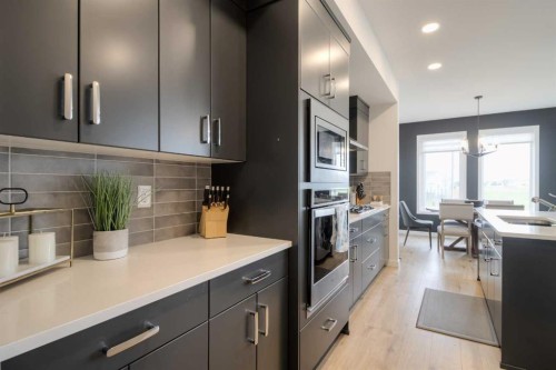 122 Greywolf Road North, Lethbridge, AB - Indoor Photo Showing Kitchen With Upgraded Kitchen