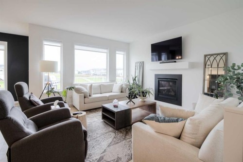 122 Greywolf Road North, Lethbridge, AB - Indoor Photo Showing Living Room With Fireplace