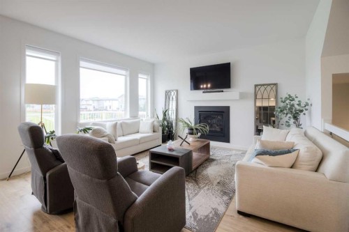 122 Greywolf Road North, Lethbridge, AB - Indoor Photo Showing Living Room With Fireplace