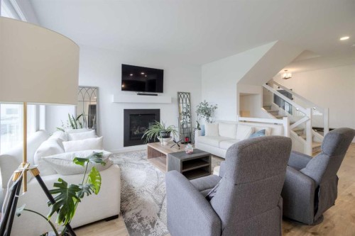 122 Greywolf Road North, Lethbridge, AB - Indoor Photo Showing Living Room With Fireplace