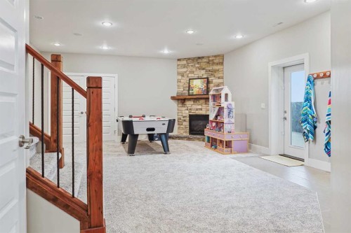 90044 Range Rd 200, Rural Lethbridge County, AB - Indoor Photo Showing Other Room With Fireplace
