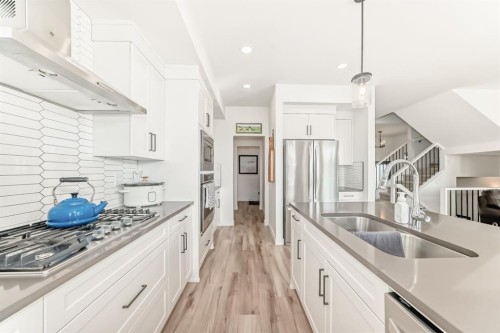 56 Greywolf Road North, Lethbridge, AB - Indoor Photo Showing Kitchen With Double Sink With Upgraded Kitchen