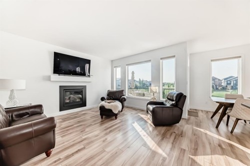 56 Greywolf Road North, Lethbridge, AB - Indoor Photo Showing Living Room With Fireplace