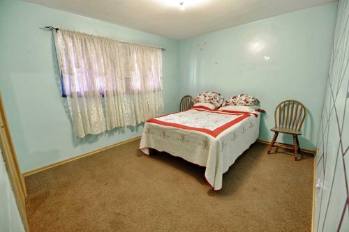 143046 Range Road 171, Rural Taber, M.D. Of, AB - Indoor Photo Showing Bedroom