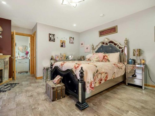 51 N 2 Street East, Hill Spring, AB - Indoor Photo Showing Bedroom