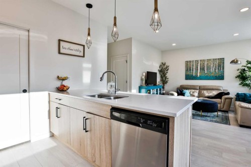 1271 Pacific Circle West, Lethbridge, AB - Indoor Photo Showing Kitchen With Double Sink