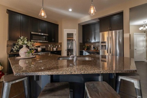 733 Twinriver Loop West, Lethbridge, AB - Indoor Photo Showing Kitchen With Double Sink With Upgraded Kitchen
