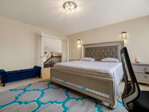 605 Couleecreek Place South, Lethbridge, AB - Indoor Photo Showing Bedroom