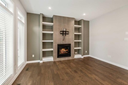 457 Westgate Crescent, Coaldale, AB - Indoor With Fireplace