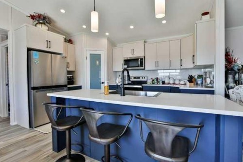 2037 Sunflower Crescent, Coaldale, AB - Indoor Photo Showing Kitchen With Stainless Steel Kitchen With Upgraded Kitchen