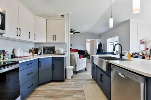 2037 Sunflower Crescent, Coaldale, AB - Indoor Photo Showing Kitchen With Upgraded Kitchen