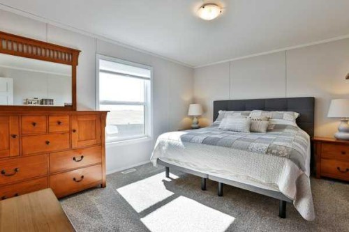 2037 Sunflower Crescent, Coaldale, AB - Indoor Photo Showing Bedroom