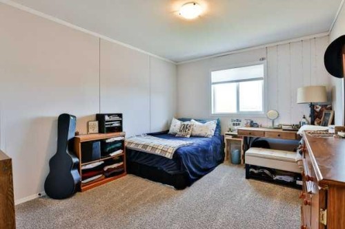 2037 Sunflower Crescent, Coaldale, AB - Indoor Photo Showing Bedroom