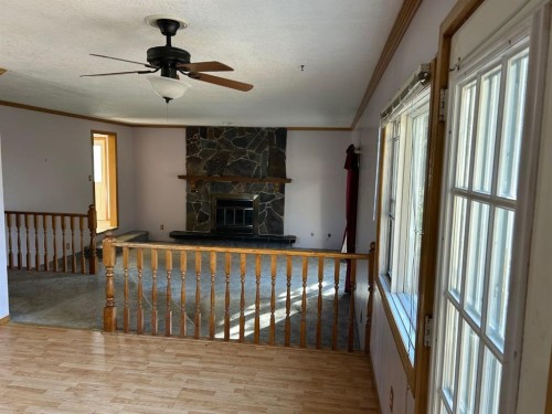 210 5 Street, Warner, AB - Indoor Photo Showing Other Room With Fireplace