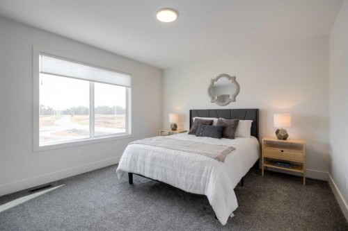 2545 16 Avenue North, Coaldale, AB - Indoor Photo Showing Bedroom