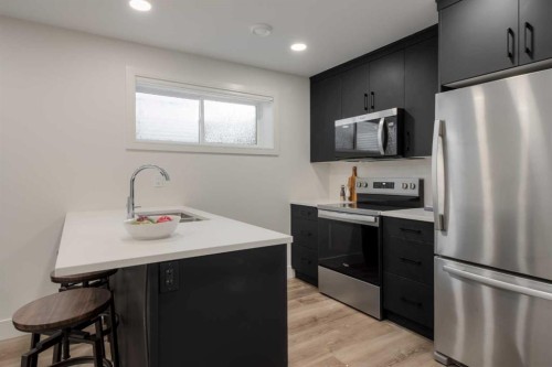 2545 16 Avenue North, Coaldale, AB - Indoor Photo Showing Kitchen With Stainless Steel Kitchen With Double Sink