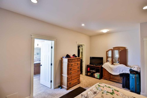 244 Sixmile Common South, Lethbridge, AB - Indoor Photo Showing Bedroom