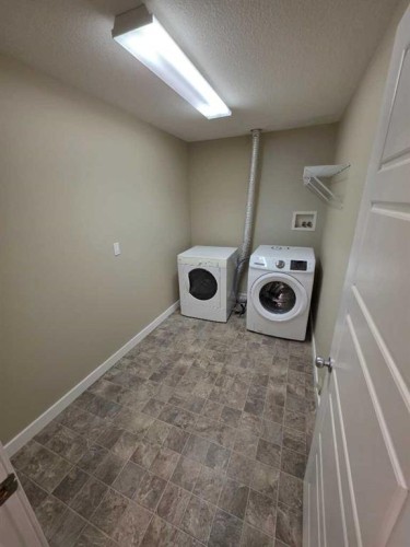 2216 18 Avenue, Coaldale, AB - Indoor Photo Showing Laundry Room