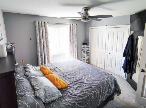 414 10A Street, Nobleford, AB - Indoor Photo Showing Bedroom