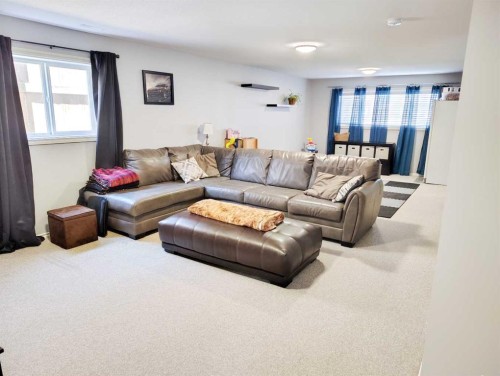 414 10A Street, Nobleford, AB - Indoor Photo Showing Living Room
