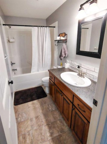 414 10A Street, Nobleford, AB - Indoor Photo Showing Bathroom