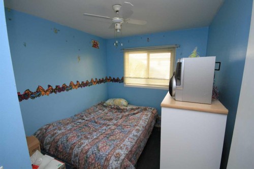 5305 56 Street, Taber, AB - Indoor Photo Showing Bedroom