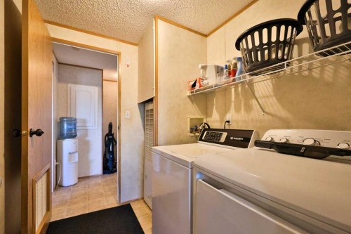 225075 Twp Rd 55, Magrath, AB - Indoor Photo Showing Laundry Room