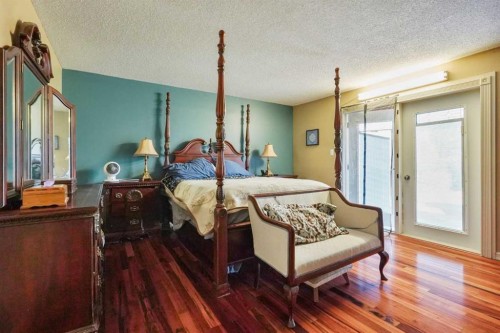 121S 100W, Raymond, AB - Indoor Photo Showing Bedroom