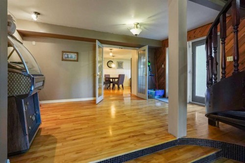 121S 100W, Raymond, AB - Indoor Photo Showing Other Room