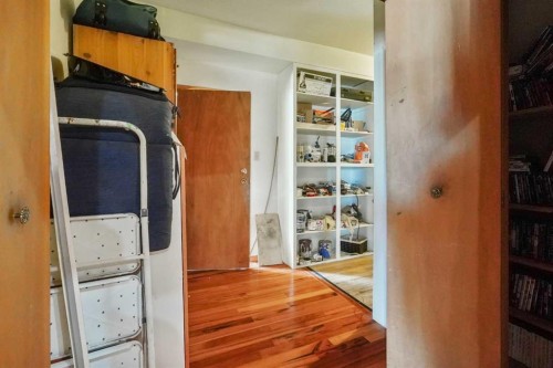 121S 100W, Raymond, AB - Indoor Photo Showing Other Room