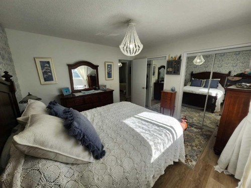 8555 Addison Place Se, Calgary, AB - Indoor Photo Showing Bedroom