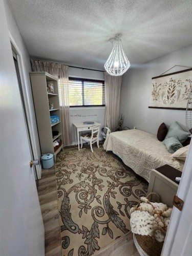 8555 Addison Place Se, Calgary, AB - Indoor Photo Showing Bedroom
