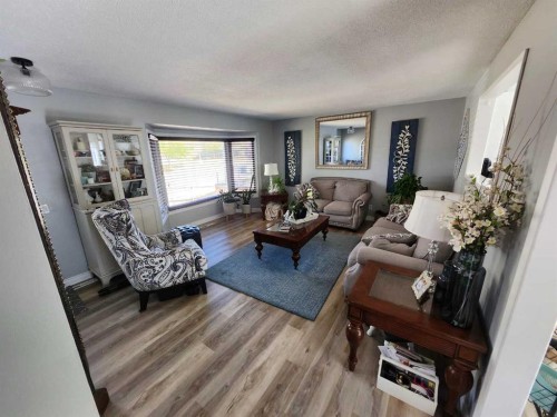 8555 Addison Place Se, Calgary, AB - Indoor Photo Showing Living Room