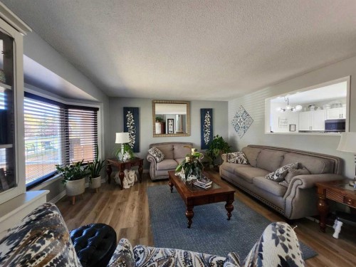 8555 Addison Place Se, Calgary, AB - Indoor Photo Showing Living Room