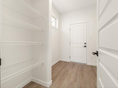 742 Violet Place West, Lethbridge, AB - Indoor With Storage