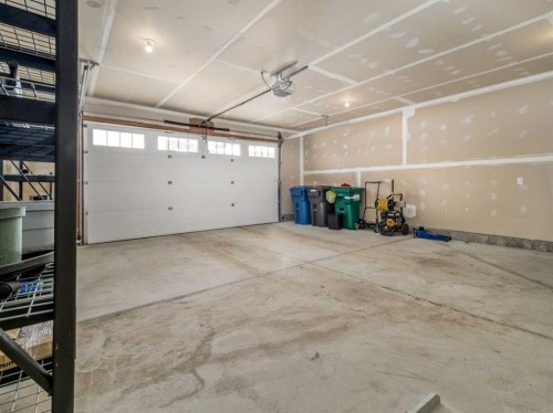 108 Gateway Mews South, Lethbridge, AB - Indoor Photo Showing Garage