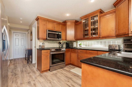 80 Canyon Boulevard West, Lethbridge, AB - Indoor Photo Showing Kitchen With Double Sink