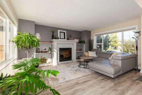 80 Canyon Boulevard West, Lethbridge, AB - Indoor Photo Showing Living Room With Fireplace